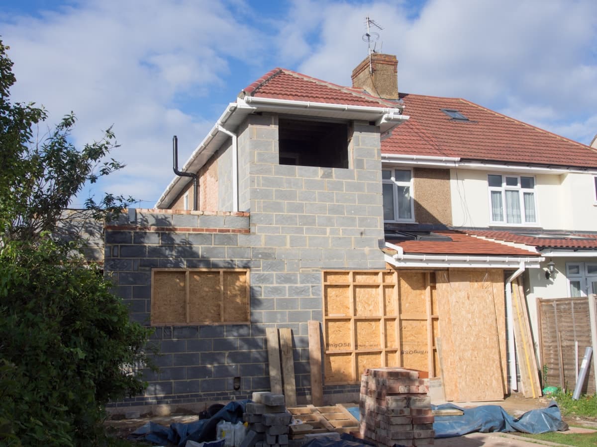 Brick house with a loft extension
