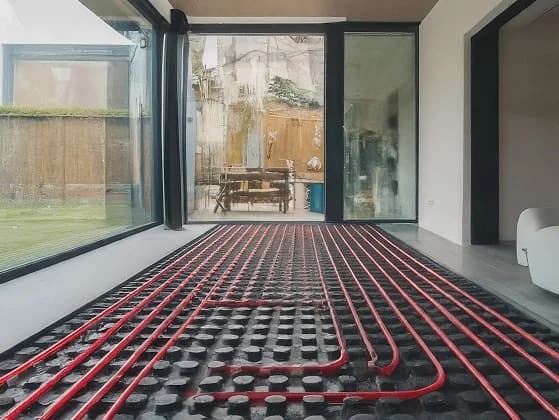 Underfloor heating pipework laid out on site